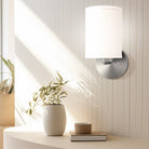 The Blair Wall Sconce from Seascape Fixtures in a living room lifestyle photograph.