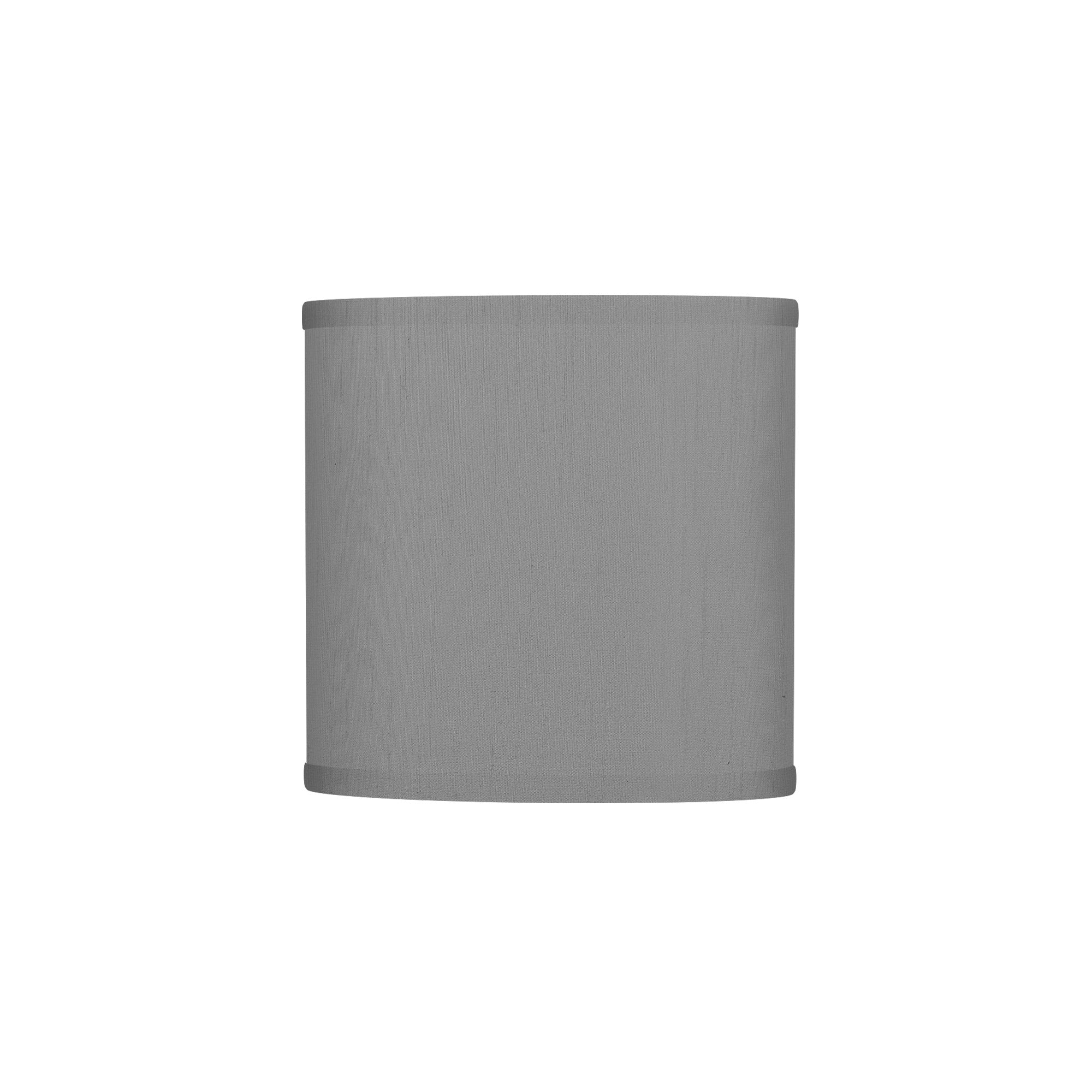 The Bryant Wall Sconce from Seascape Fixtures with a silk shade in gunmetal color.