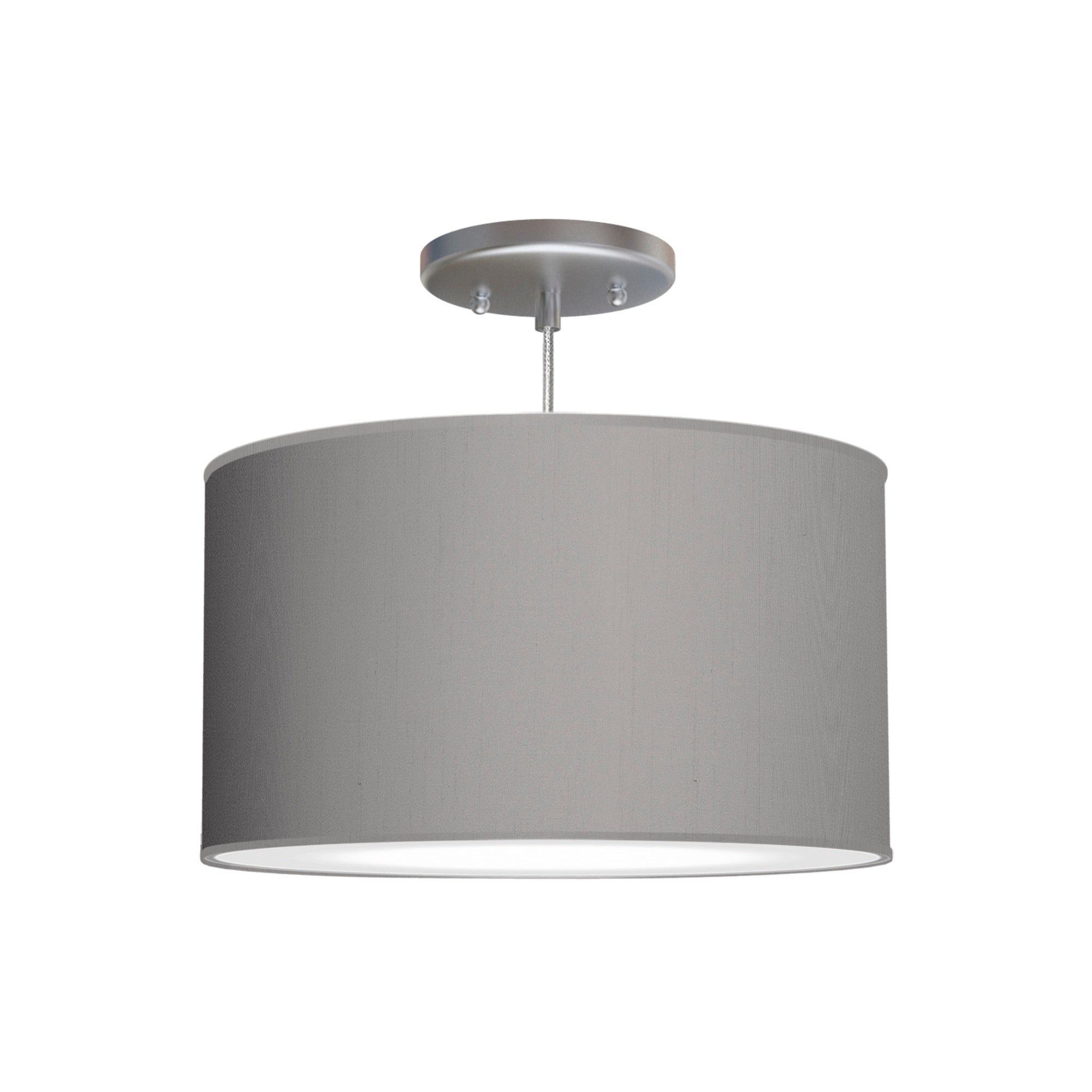 The Gab Hanging Lamp from Seascape Fixtures with a silk shade in gunmetal color.