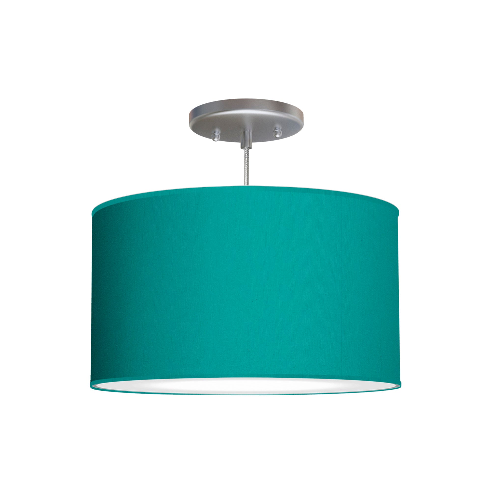 The Gab Hanging Lamp from Seascape Fixtures with a silk shade in turquoise color.