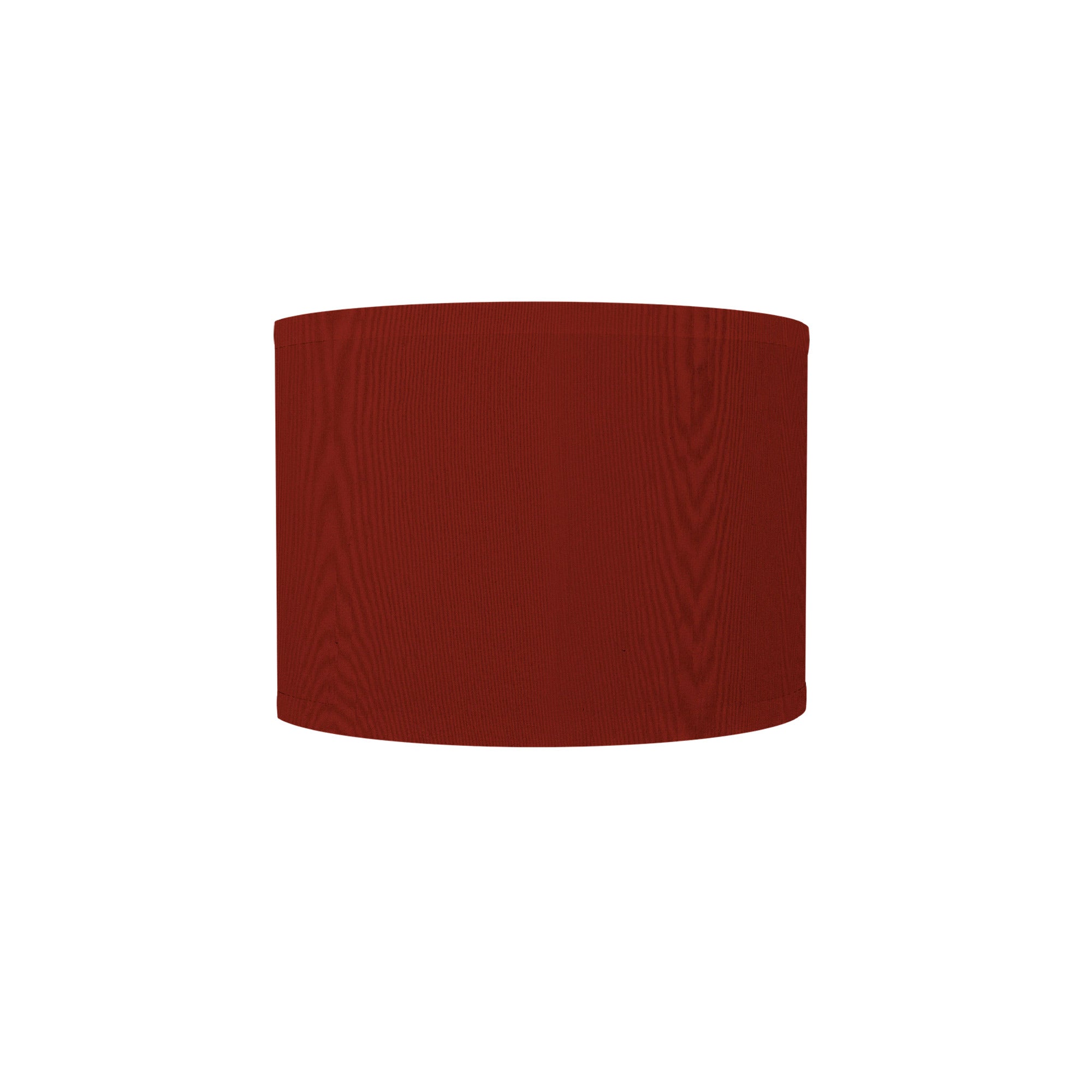 The Bryce Wall Sconce from Seascape Fixtures with a silk shade in burgundy color.