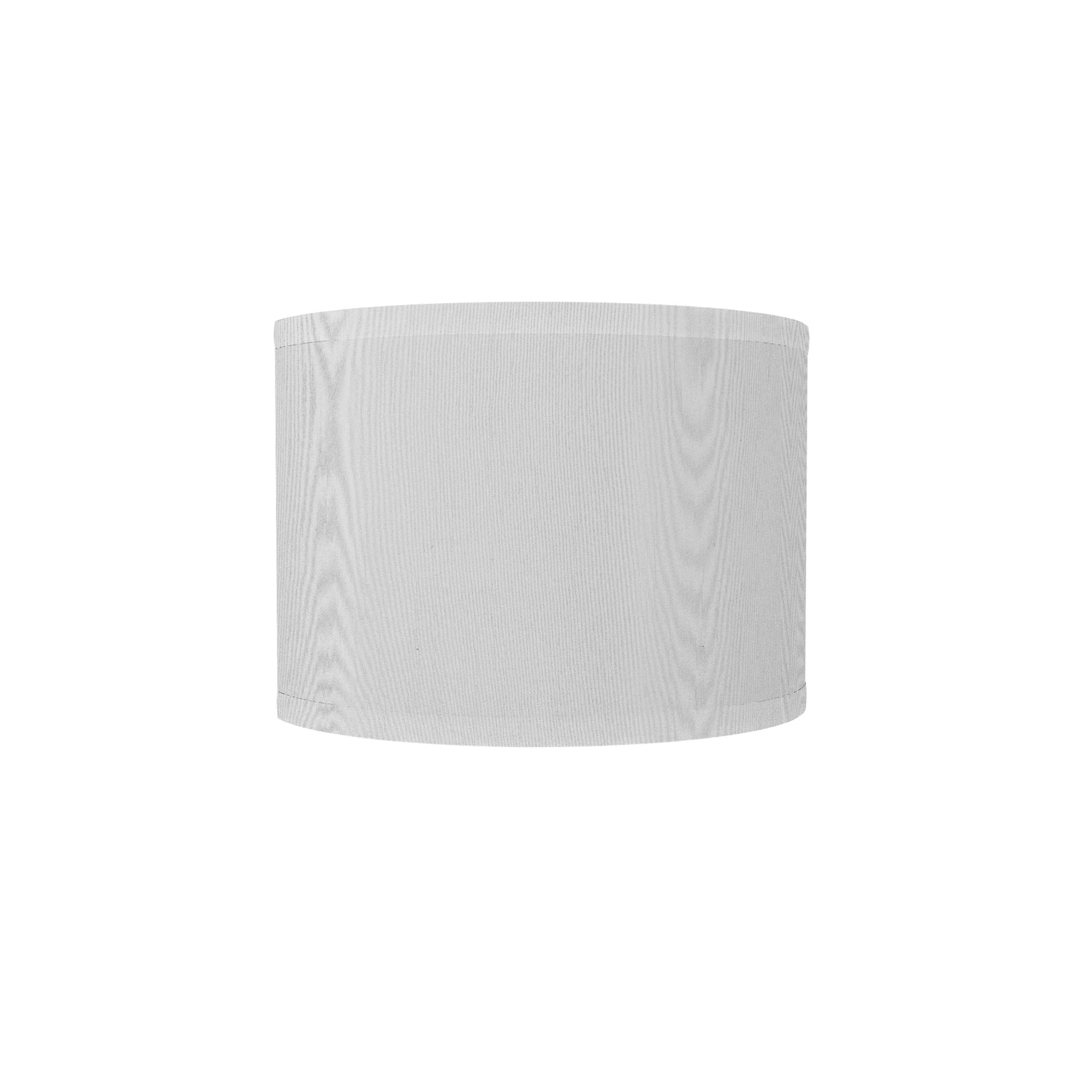 The Bryce Wall Sconce from Seascape Fixtures with a silk shade in white color.