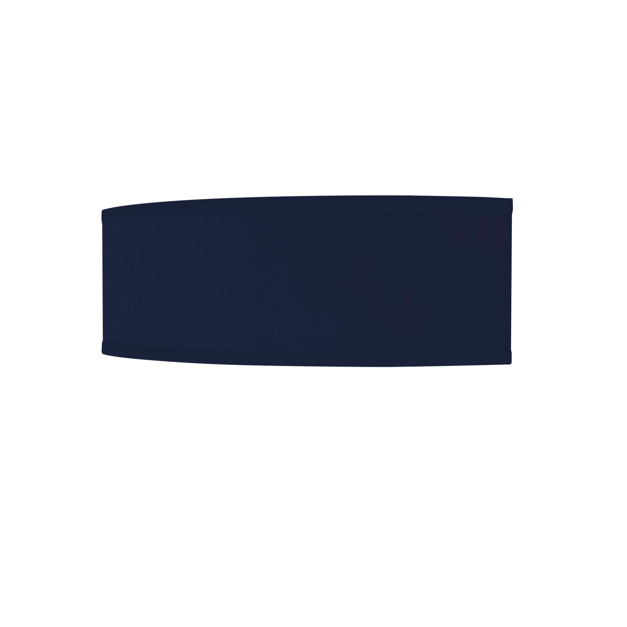 The Mora Wall Sconce from Seascape Fixtures with a linen shade in navy color.