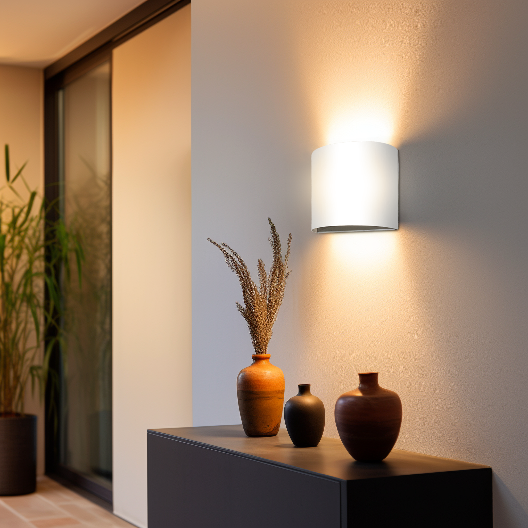The Vita Wall Sconce from Seascape Fixtures in a living room lifestyle photograph.